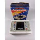 A BOXED RETRO ONE ON ONE ASTRO INVADER HAND HELD GAME