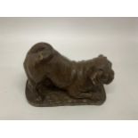 A DORIS LINDNER BRONZED RESIN MODEL OF A DOG, SIGNED TO REVERSE, TAIL A/F