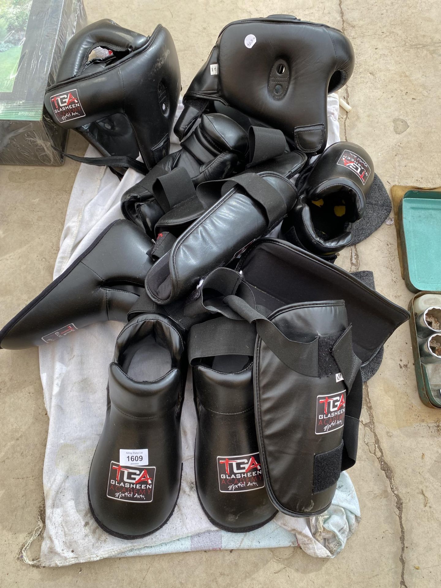 AN ASSORTMENT OF TGA GLASHEEN KICK BOXING EQUIPMENT