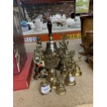 A QUANTITY OF ORNATE BRASS BELLS TO INCLUDE A SCHOOL BELL, SHIP BELLS, ANIMAL BELLS, ETC.,