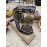 AN ASSORTMENT OF FIRE ITEMS TO INCLUDE A WOODEN FENDER, VARIOUS FIRE SCREENS AND FIRE FRONTS ETC