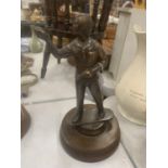 A SPELTER FIGURE OF A DARTS PLAYER HEIGHT 22CM