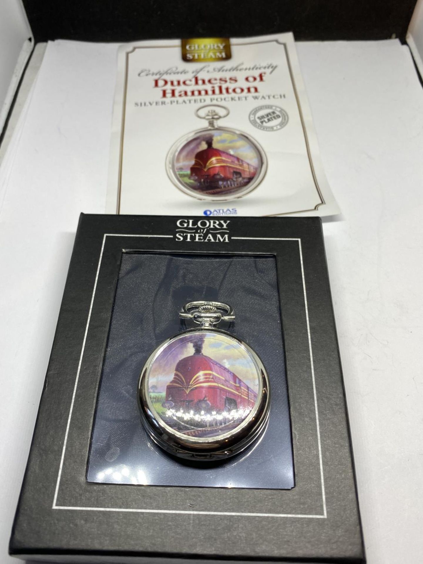 A DUCHESS OF HAMILTON SILVER PLATED POCKET WATCH SEEN WORKING BUT NO WARRANTY WITH COA AND BOX