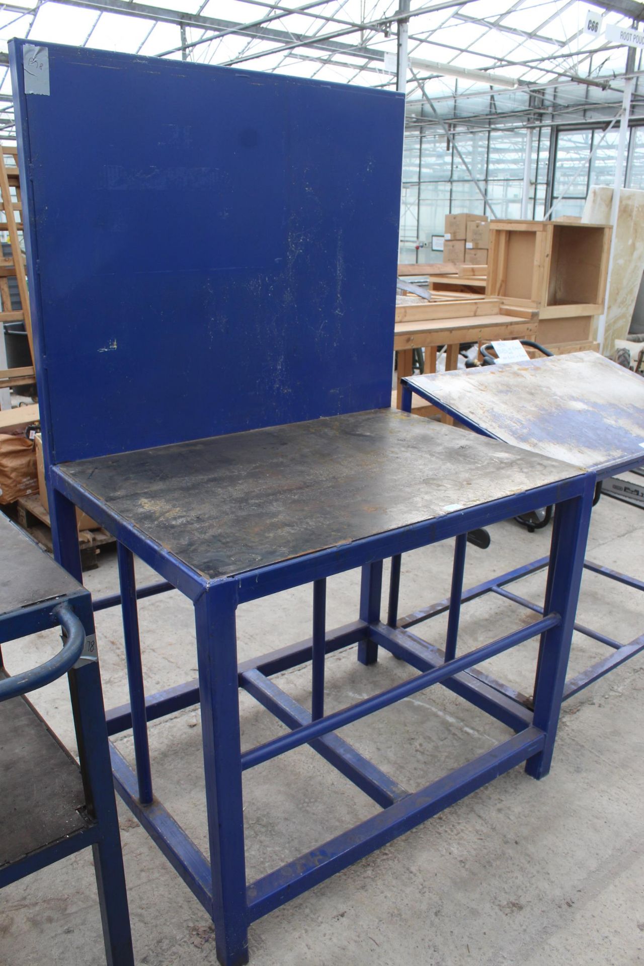 A HEAVY DUTYB STEEL BENCH WITH A BACK + VAT