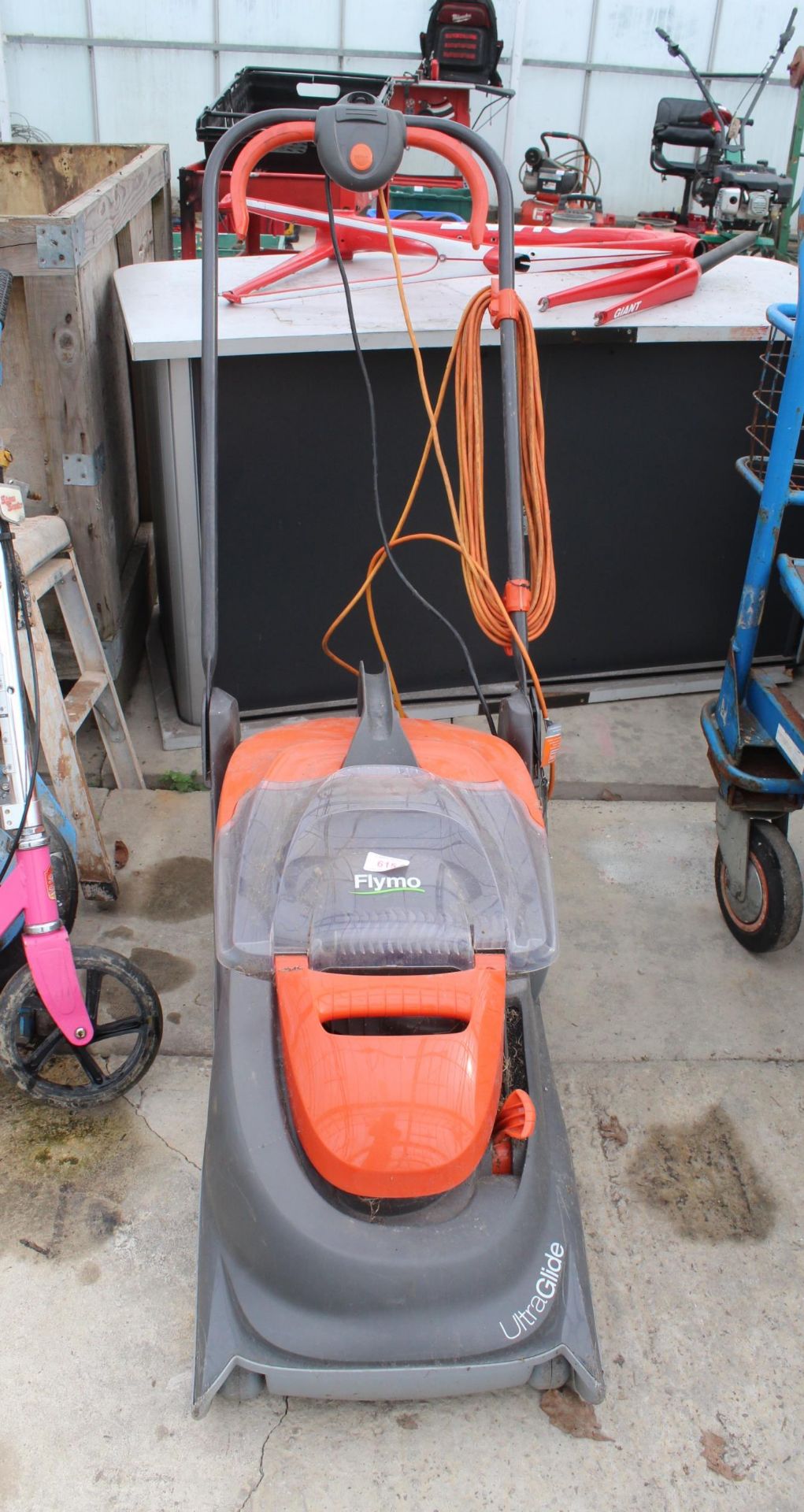 A FLYMO ULTRAGUIDE ELECTRIC LAWN MOWER NO VAT