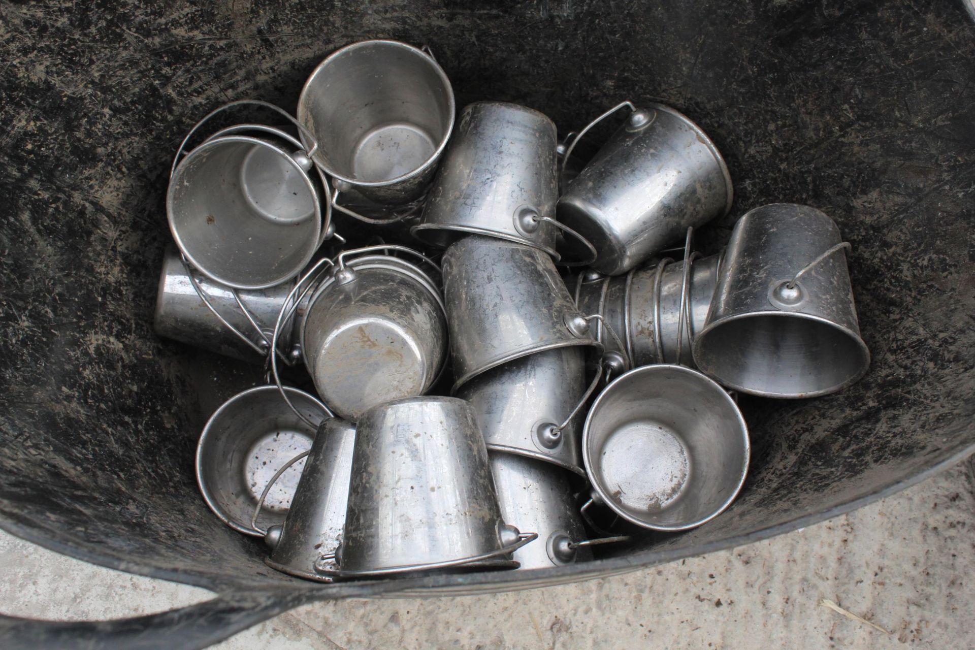 AN COLLECTION OF STAINLESS STEEL MINITURE BUCKETS NO VAT