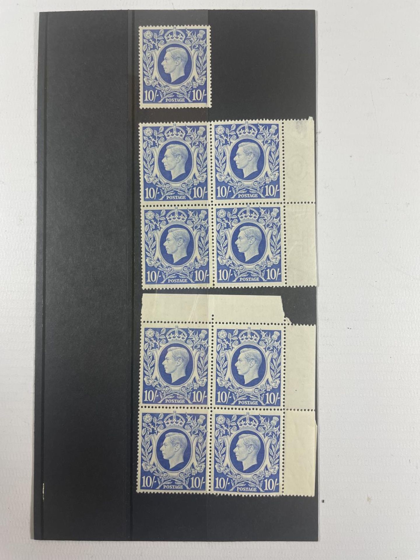 GREAT BRITAIN 30.11.42. 10/- ULTRAMARINE , TWO BLOCKS OF FOUR PLUS ONE SINGLE , UNMOUNTED MINT .