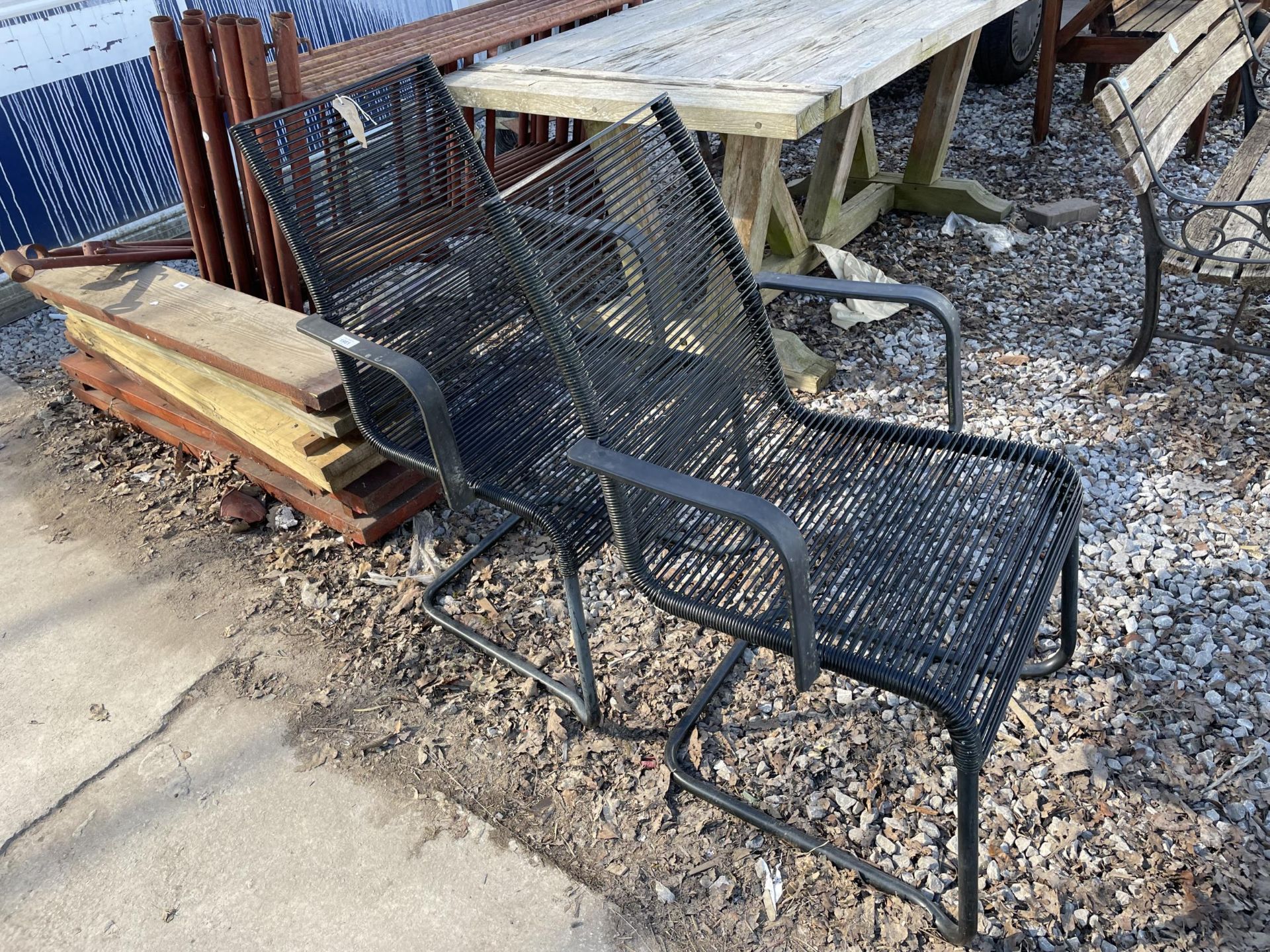 TWO METAL GARDEN CHAIRS WITH PLASTIC STRING SEATS
