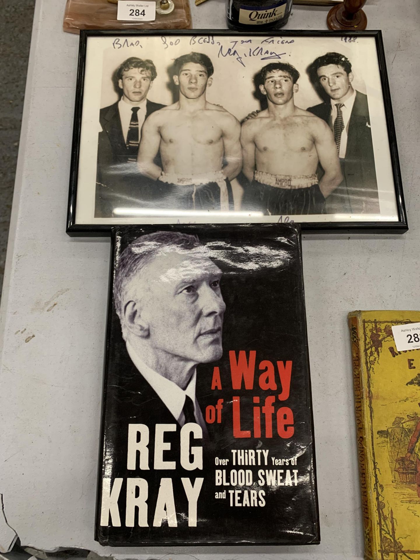 A SIGNED COPY OF REG KRAY 'A WAY OF LIFE' PLUS A SIGNED PHOTO OF THE KRAY TWINS