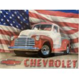 A CHEVROLET TIN SIGN 40CM X 32CM