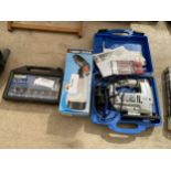 AN ASSORTMENT OF TOOLS TO INCLUDE AN ELECTRIC JIGSAW AND A ROUTER BIT SET ETC