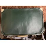 A VINTAGE GREEN LEATHER SUITCASE