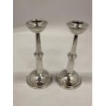 A PAIR OF ART DECO SILVER CANDLESTICKS, HALLMARKS FOR BIRMINGHAM, 1924, MAKERS HARRISON & HIPWOOD,