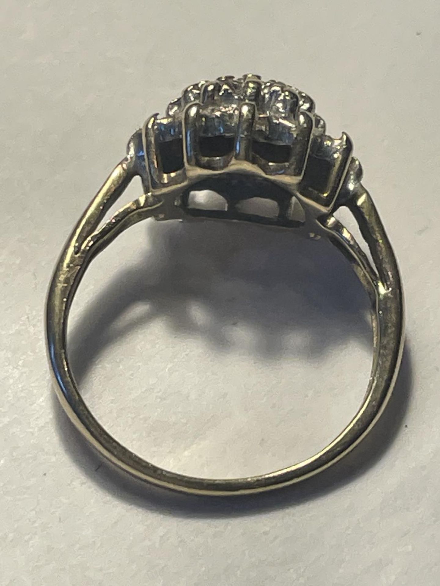 A 9 CARAT GOLD RING WITH DIAMOND CLUSTER SIZE I/J - Image 4 of 4