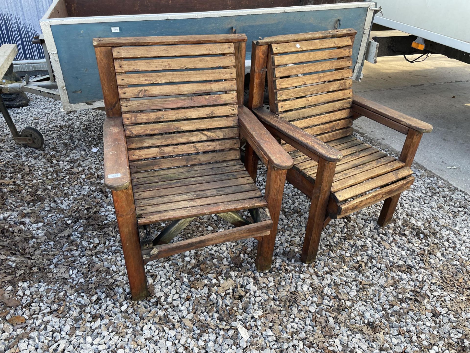 TWO WOODEN SLATTED GARDEN CHAIRS