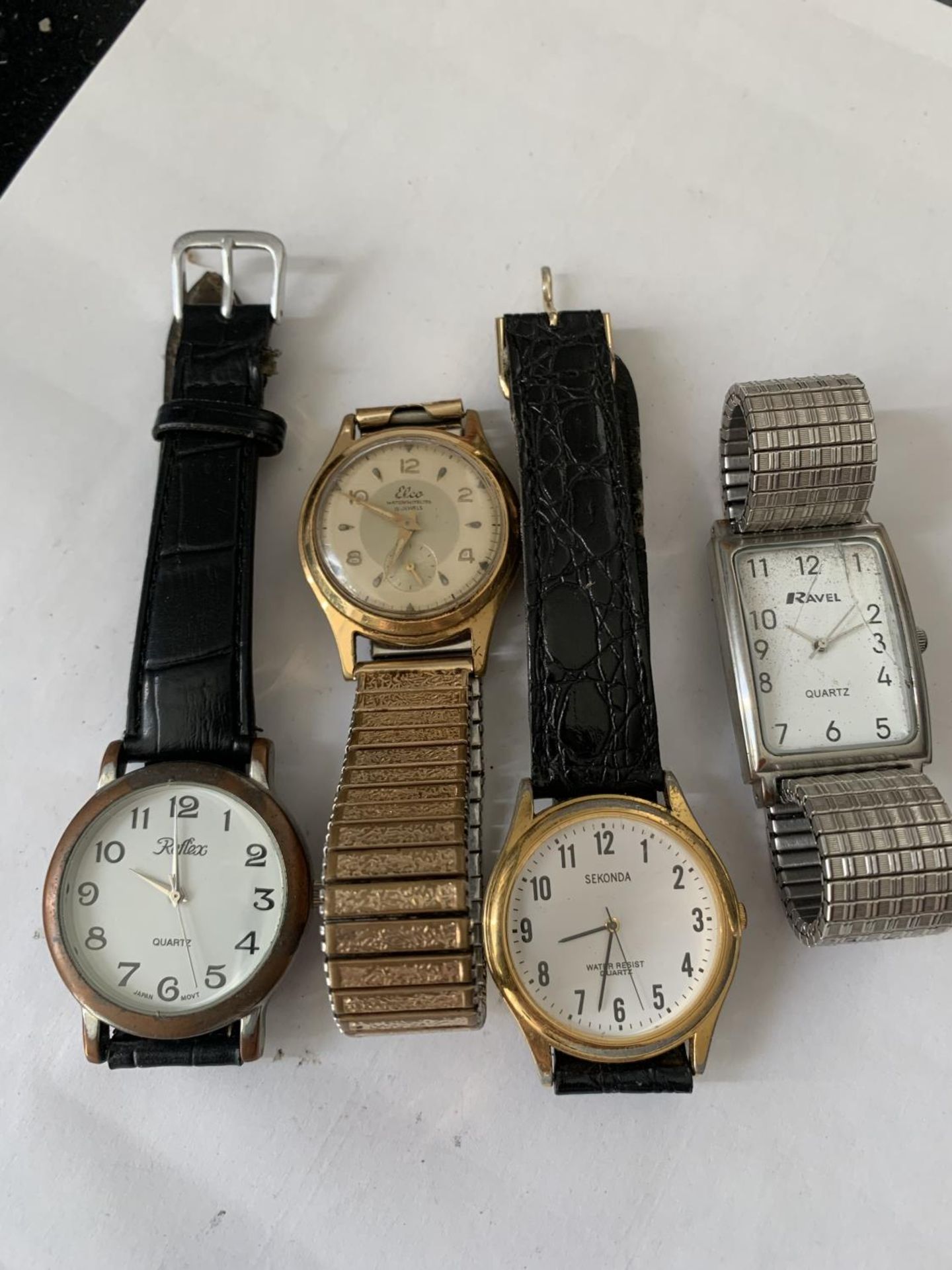 FOUR VARIOUS FASHION WATCHES TO INCLUDE SEKONDA, REFLEX, RAVEL ETC