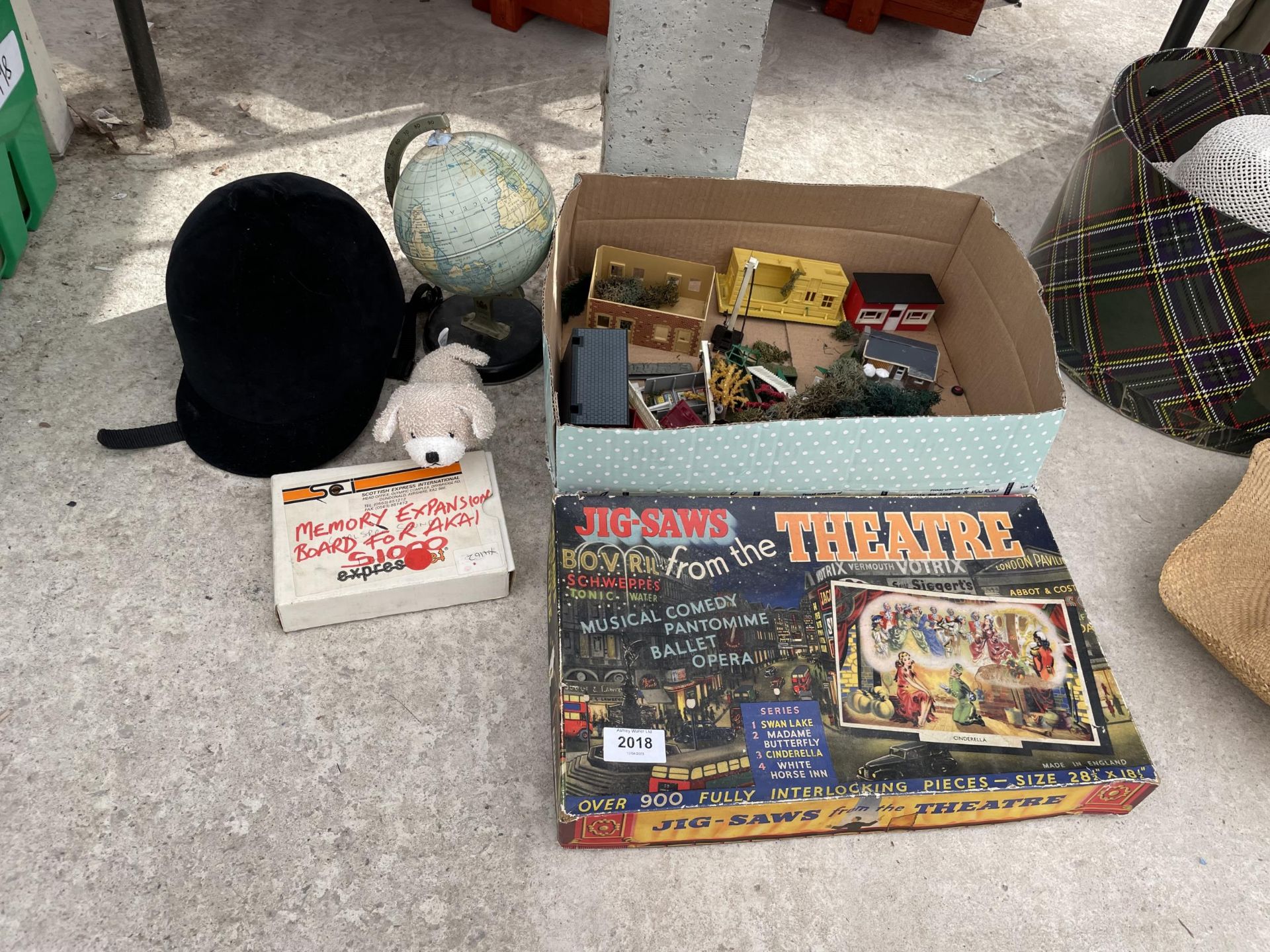 AN ASSORTMENT OF ITEMS TO INCLUDE A JIGSAW, A GLOBE AND TRAIN TRACK ITEMS ETC