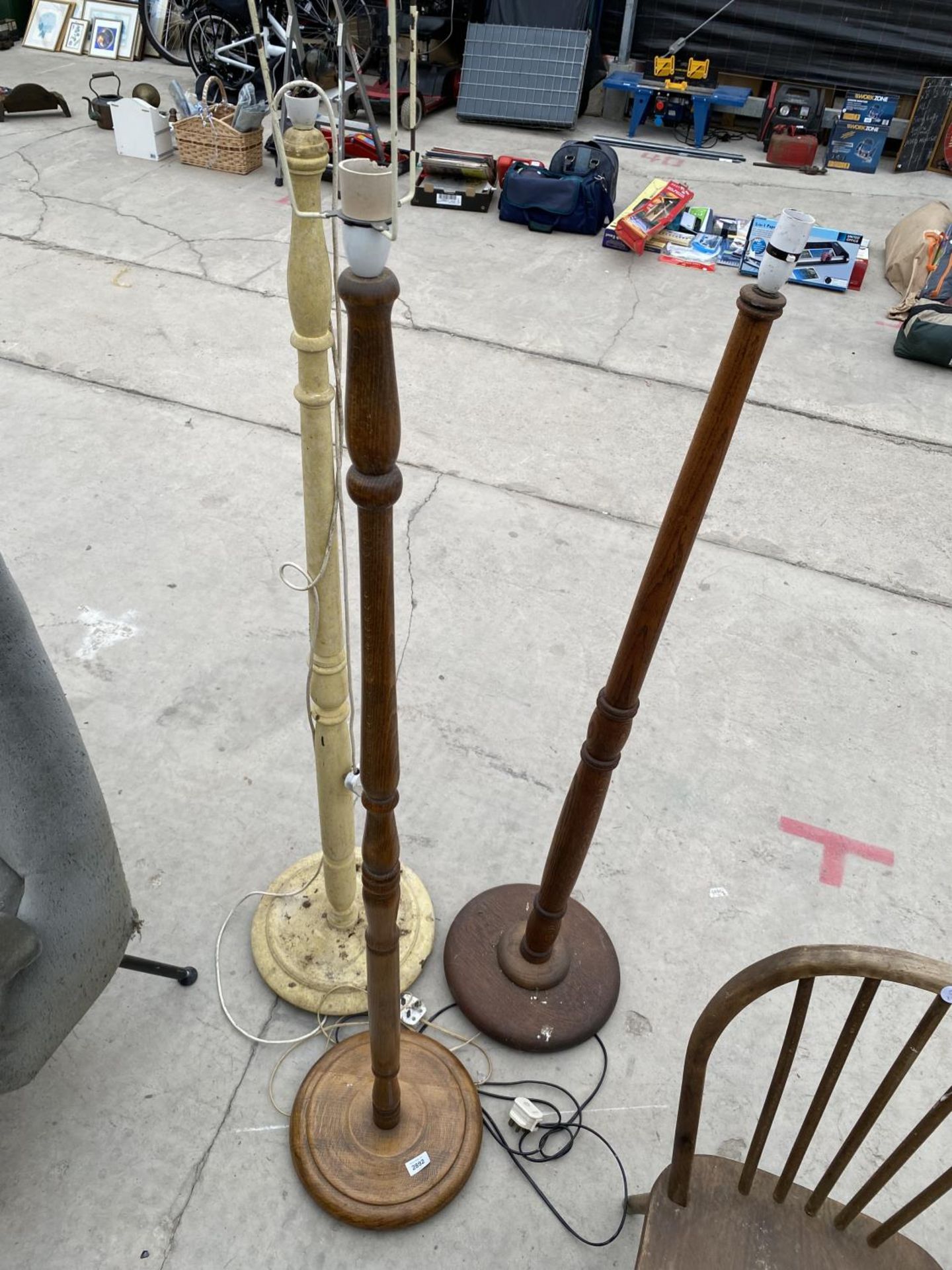 THREE STANDARD LAMPS WITH TURNED COLUMN