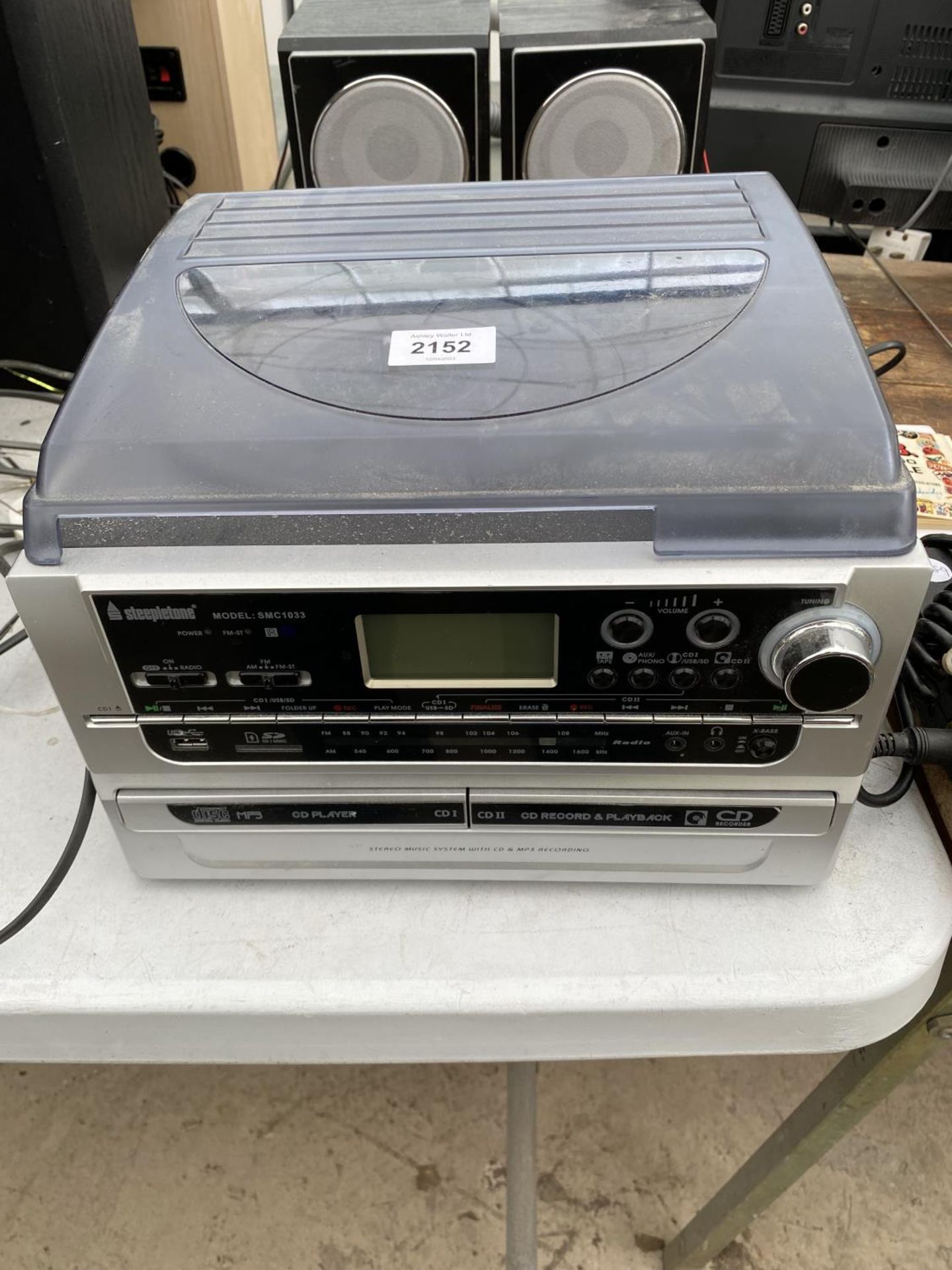 A STEEPLETONE STEREO AND TWO SPEAKERS