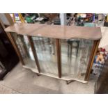 A 1960'S GLASS THREE DOOR CABINET WITH FLORAL DECORATION ON GLASS