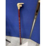 A VINTAGE WALKING STICK WITH MONKEY DESIGN HANDLE