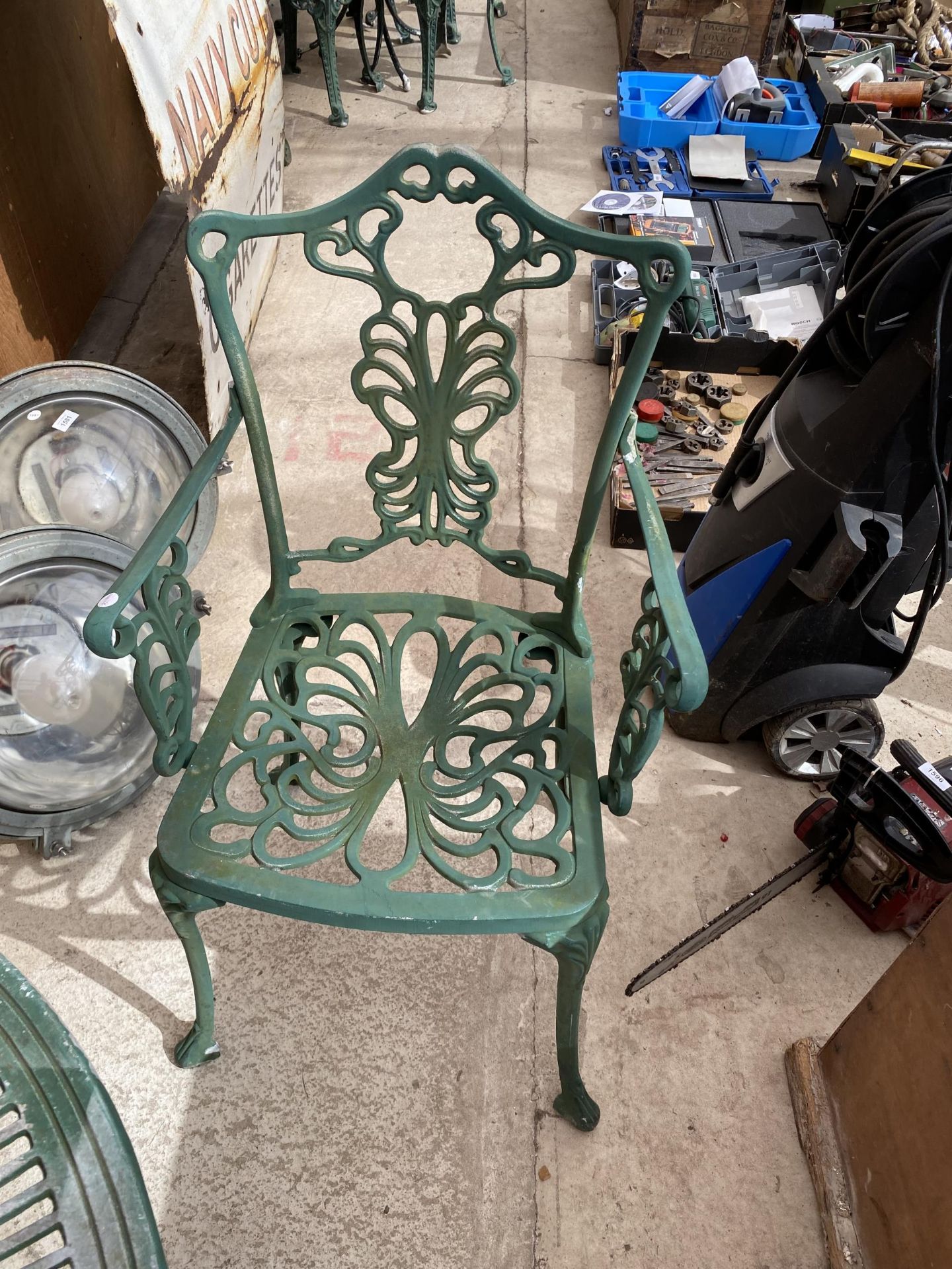 A CAST ALLOY BISTRO SET COMPRISING OF A ROUND TABLE AND TWO CARVER CHAIRS - Image 3 of 3