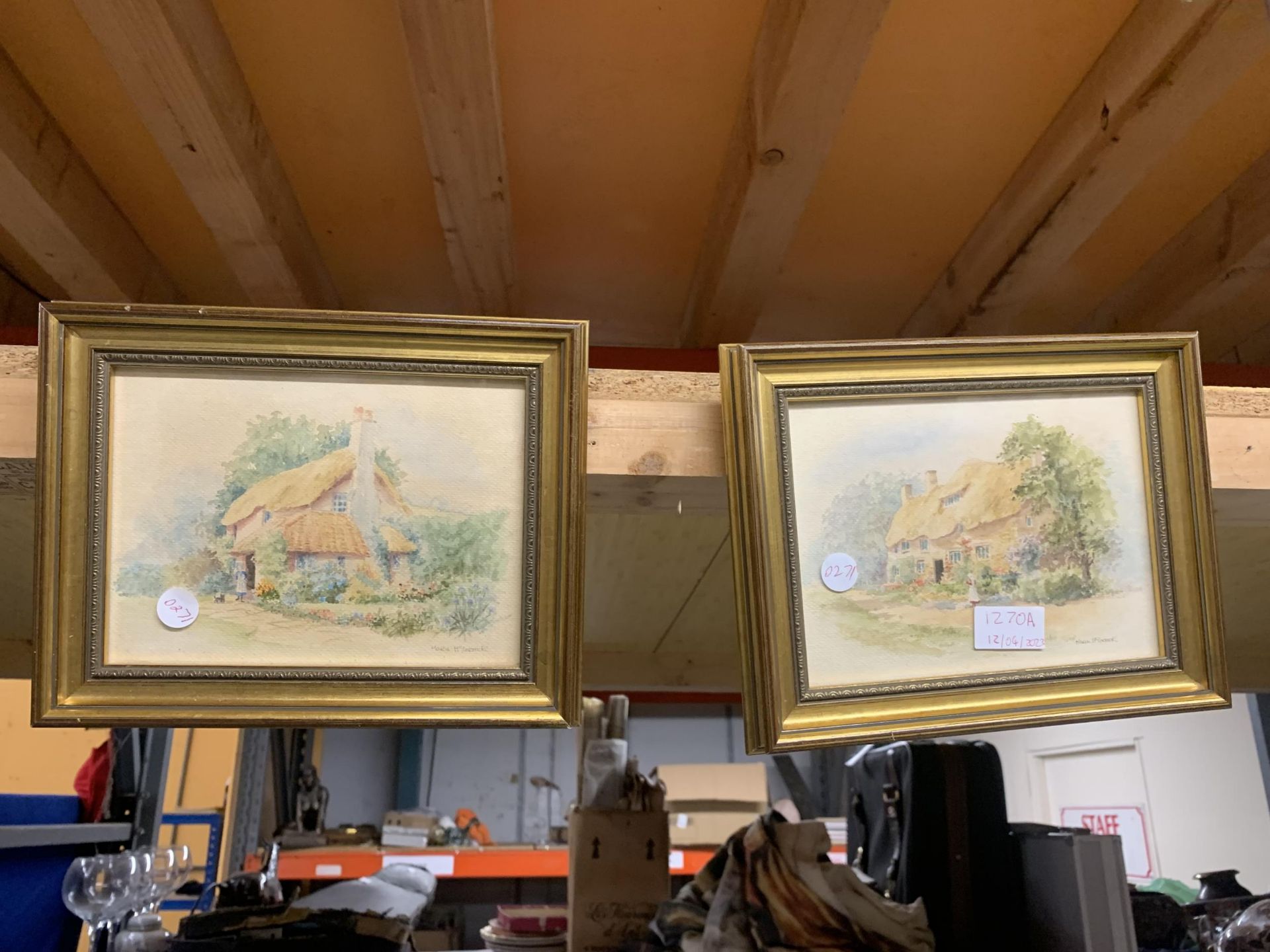 TWO WATERCOLOURS OF COTTAGES BY MARIE McCORMICK OF CONGLETON IN GILT FRAMES 25.5CM X 20.5CM