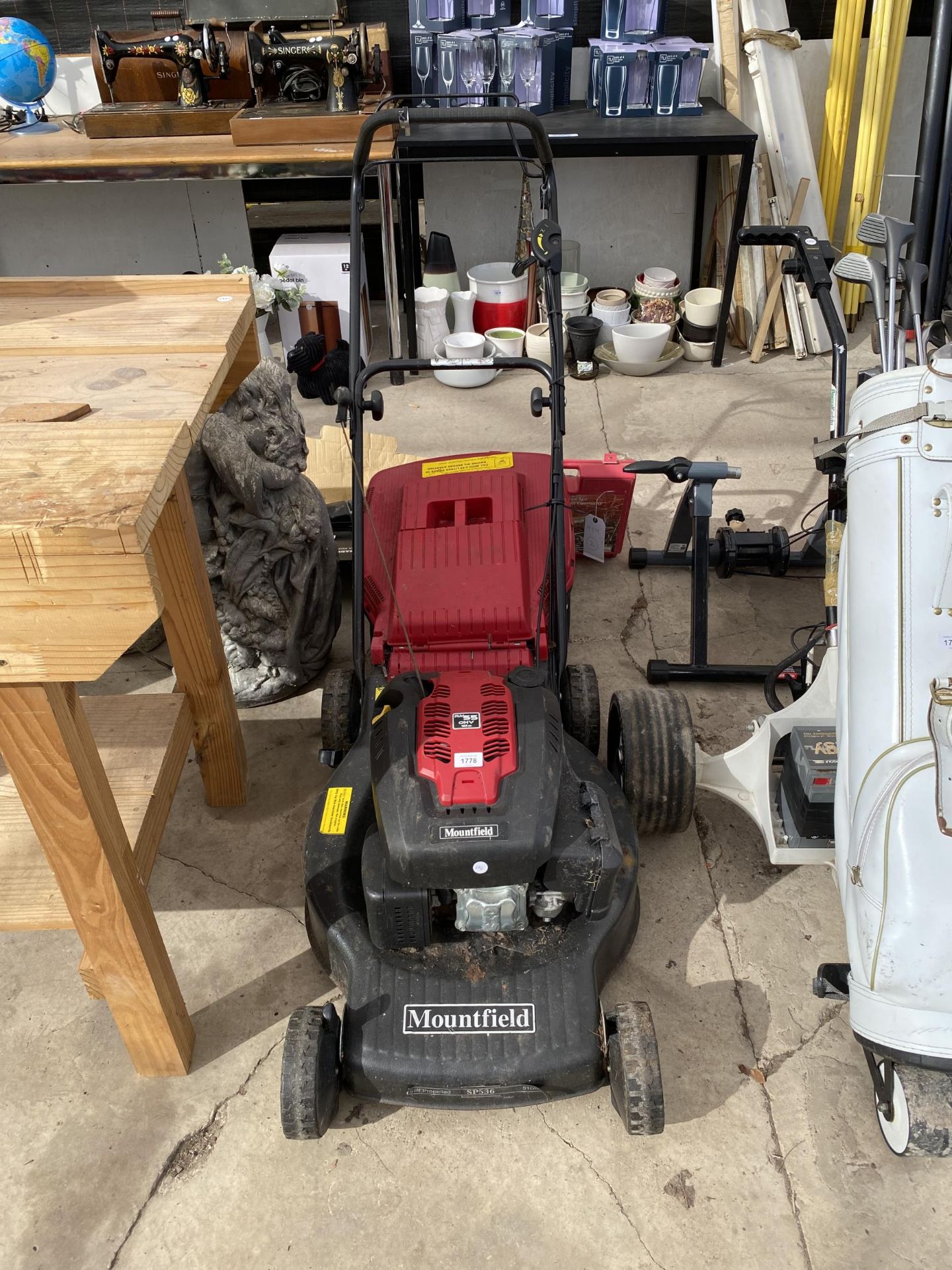 A MOUNTFIELD SP536 PETROL LAWN MOWER WITH GRASS BOX