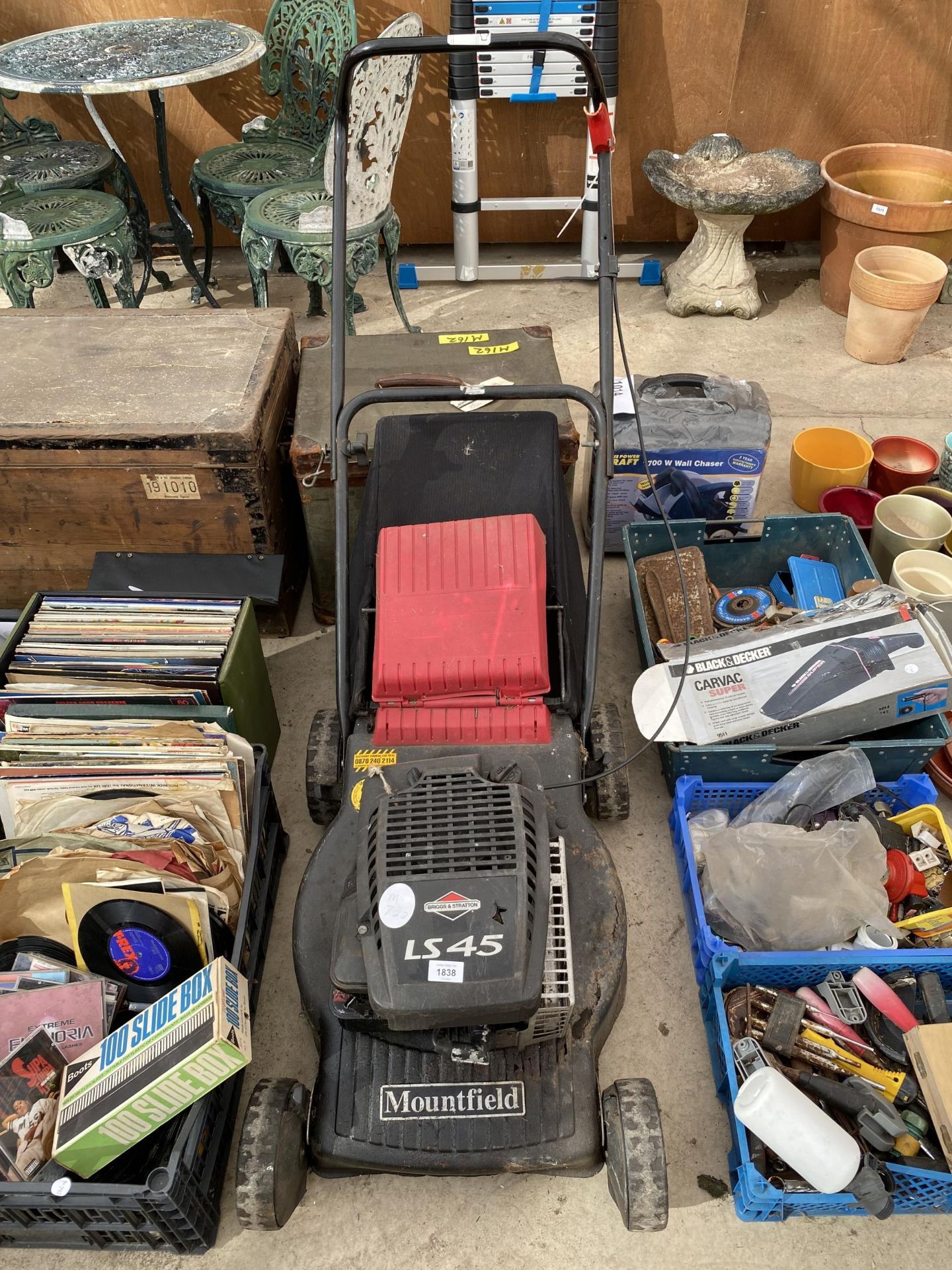 A MOUNTFIELD LAWN MOWER WITH BRIGGS AND STRATTON PETROL ENGINE