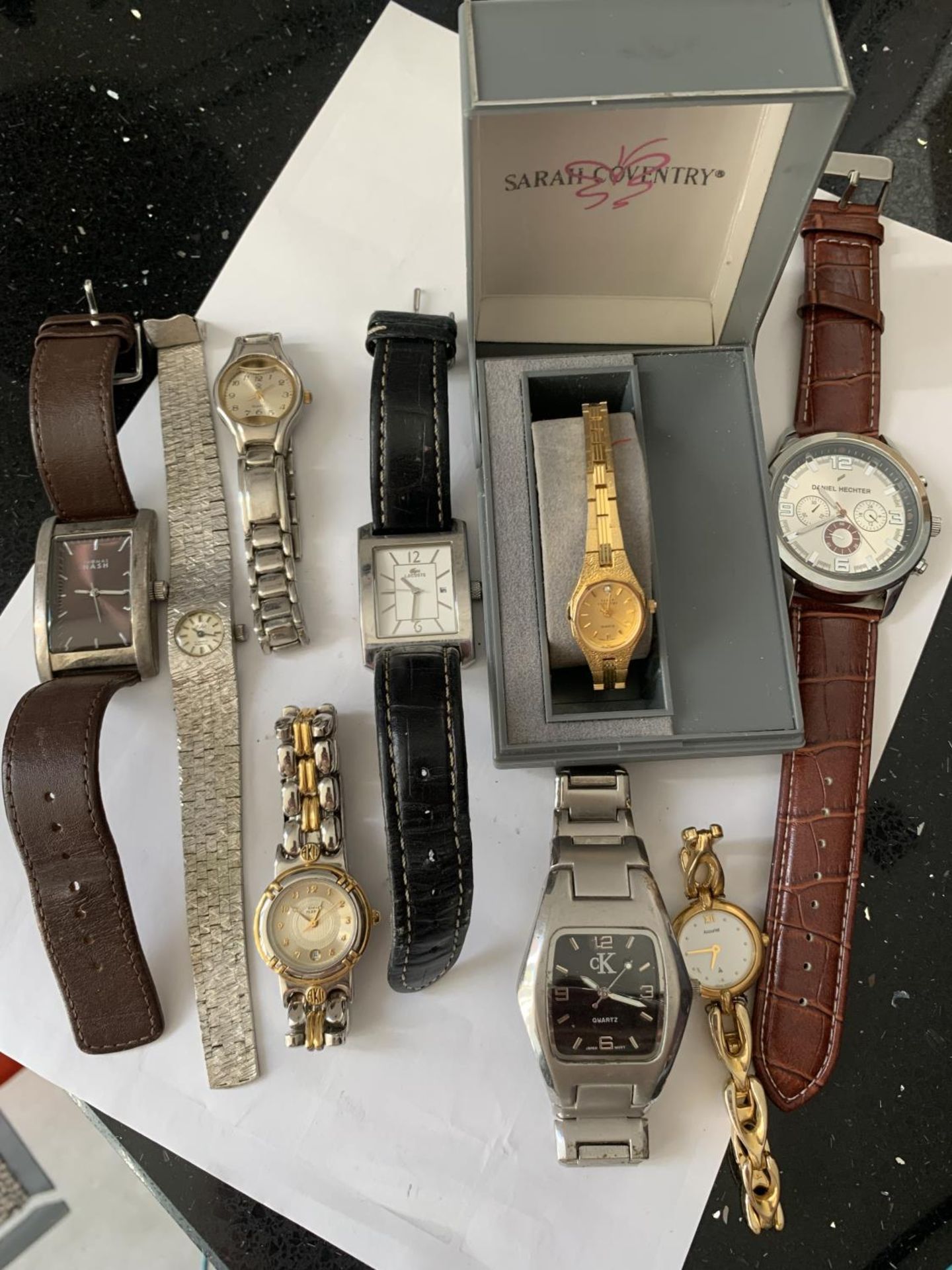 NINE VARIOUS FASHION WATCHES