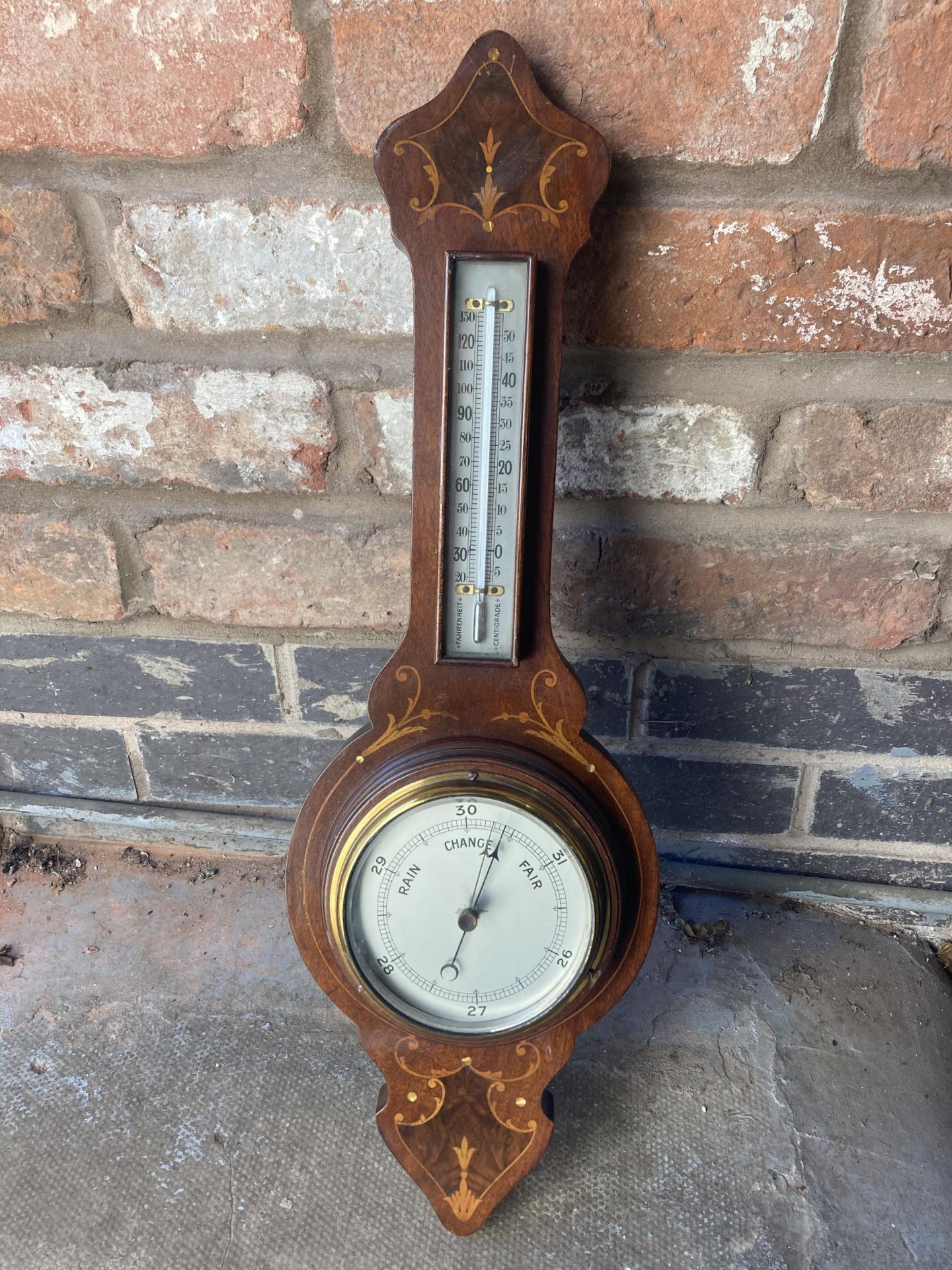 A MAHOGANY CASED BAROMETER WITH EDWARDIAN STYLE INLAY