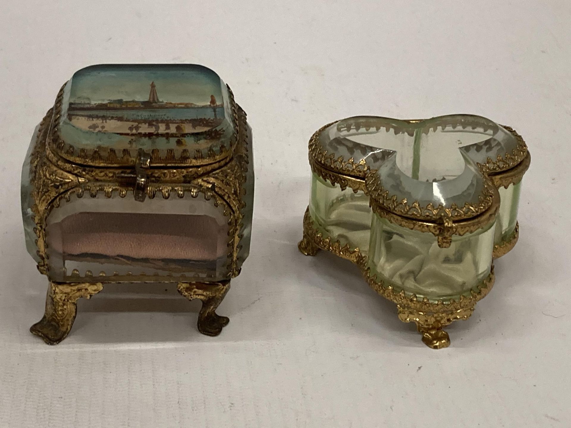 TWO EARLY 20TH CENTURY GILT DESIGN TINKET BOXES - ONE WITH IMAGE OF BLACKPOOL FROM THE NORTH TIER,