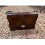 A GENUINE SALISBURYS BROWN LEATHER SHOULDER BAG WITH GOLD CLASP