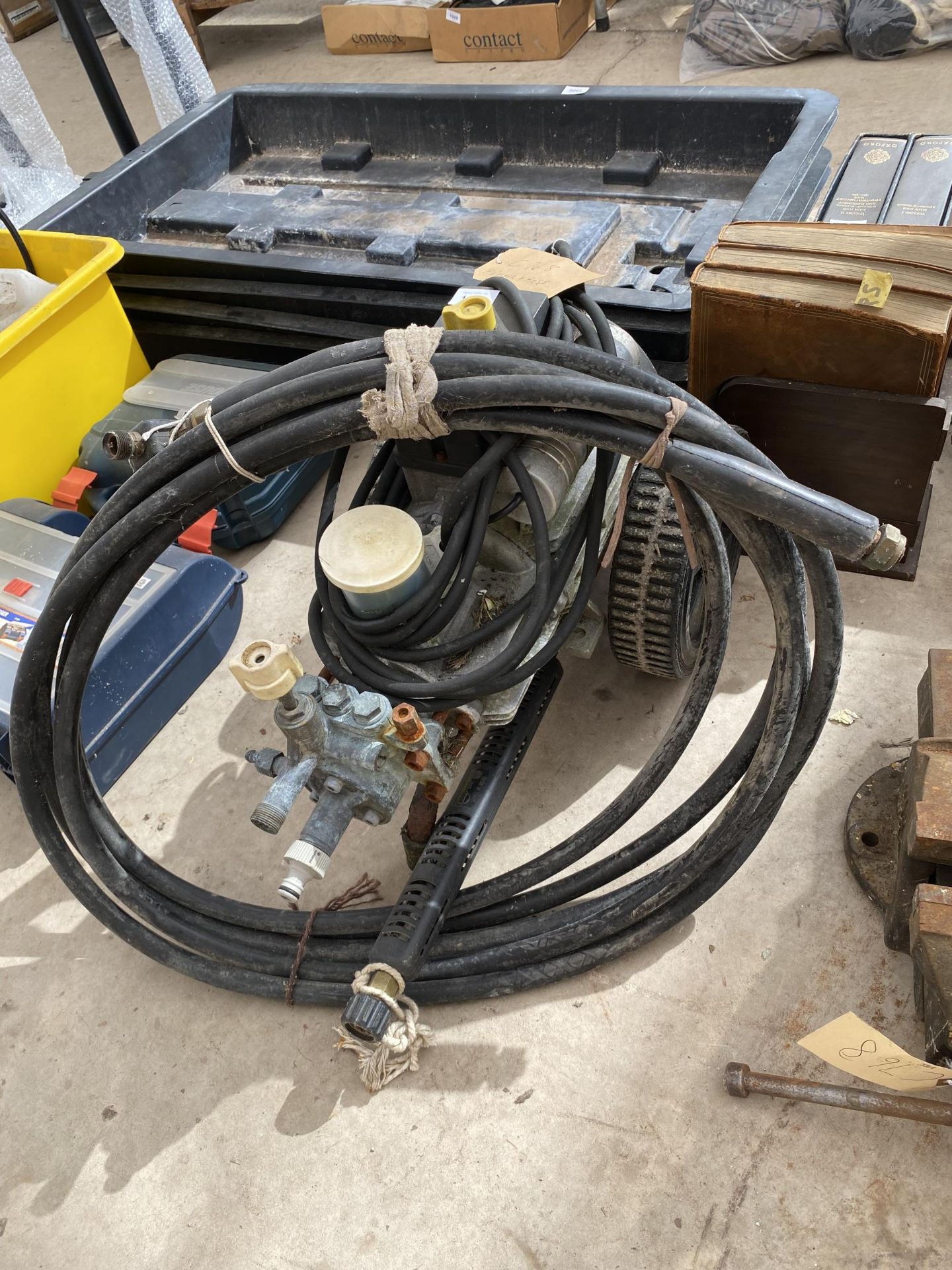 AN ELECTRIC PRESSURE WASHER AND HOSE