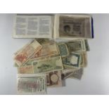 A SELECTION OF OLD BANKNOTES TO INCLUDE HONG KONG , JAPAN , UK ARMED FORCES , GERMANY , YUGOSLAVIA