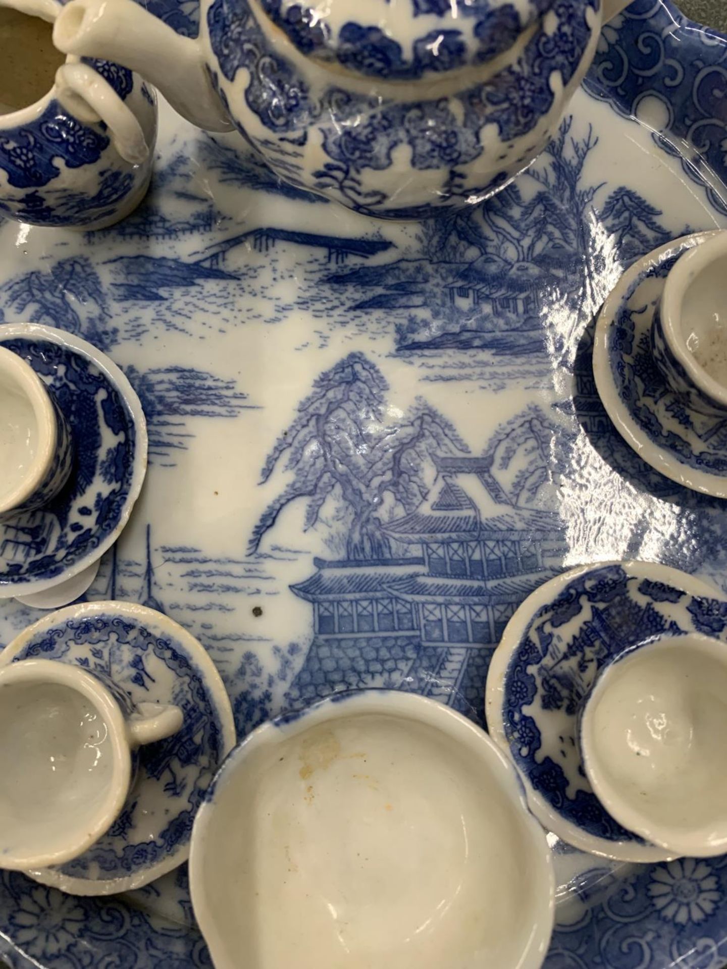 A MINIATURE VICTORIAN BLUE AND WHITE TEASET ON A TRAY - Image 2 of 2