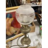 A VINTAGE OIL LAMP WITH FROSTED AND ETCHED SHADE AND GLASS CHIMNEY