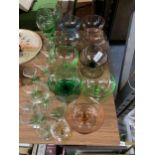 A QUANTITY OF COLOURED GLASS TO INCLUDE DESSERT BOWLS AND DRINKING GLASSES