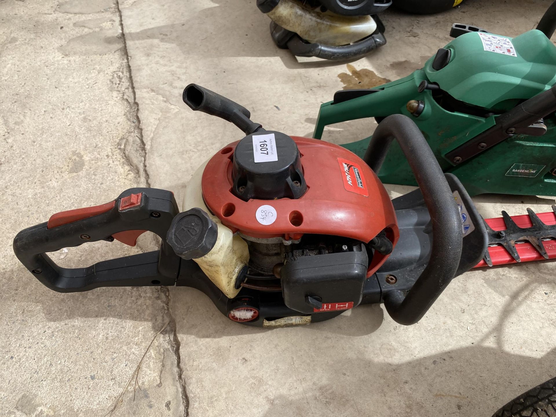 A MOUNTFIELD PETROL HEDGE TRIMMER AND A PETROL CHAINSAW - Image 2 of 3