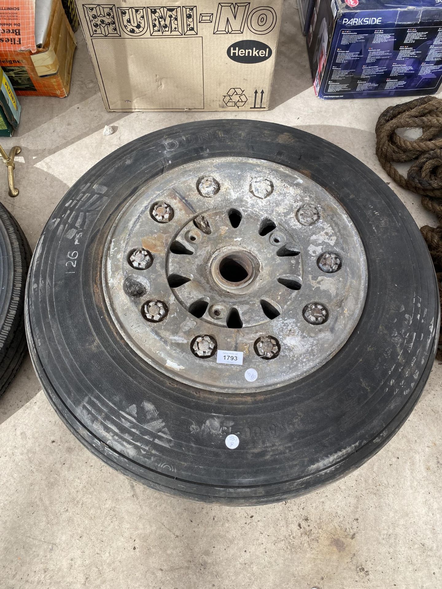 A VINTAGE BELIEVED WWII AREOPLANE WHEEL