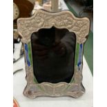 AN ART NOUVEAU STYLE STERLING SILVER AND ENAMEL PHOTO FRAME