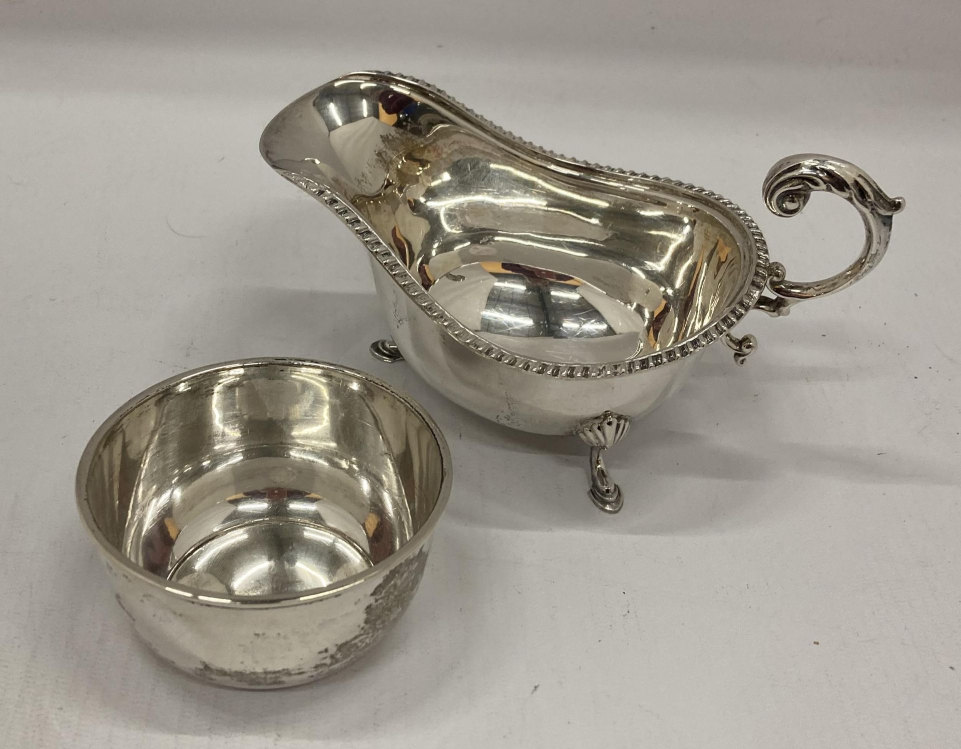TWO BIRKS STERLING SILVER HALLMARKED ITEMS - CUP AND GRAVY / SAUCE BOAT, TOTAL WEIGHT 78G