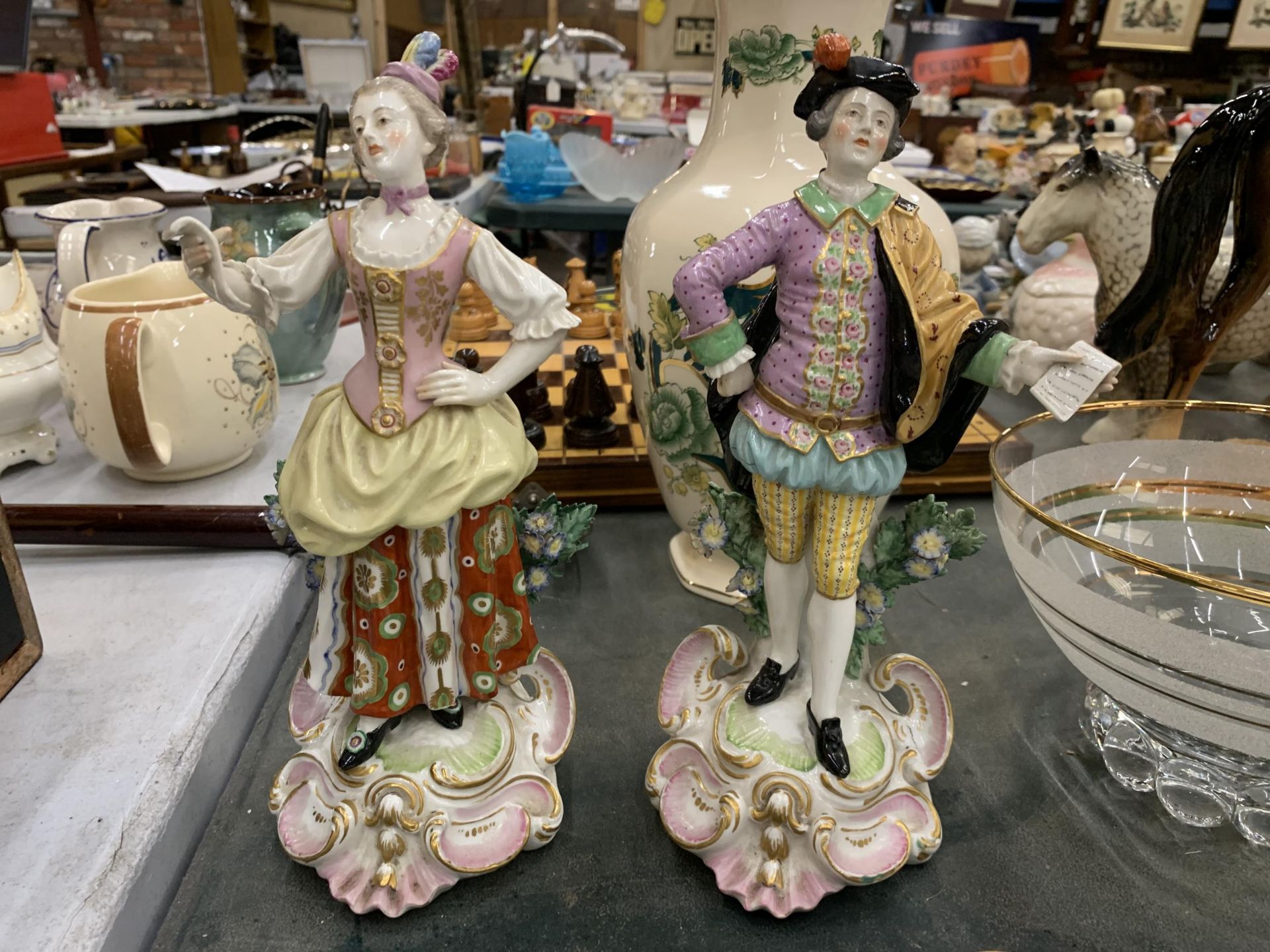 A PAIR OF VINTAGE STAFFORDSHIRE FIGURES