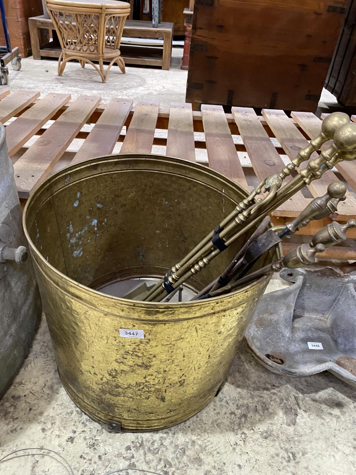 A VINTAGE BRASS BUCKET WITH FIRESIDE ITEMS