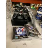 A PLAYSTATION 2 CONSOLE WITH CONTROLLER AND GAMES TO INCLUDE MEDAL OF HONOUR UNDERGROUND, 007 THE
