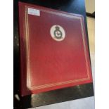 A RED STAMP ALBUM OF GB, USA AND WORLD STAMPS