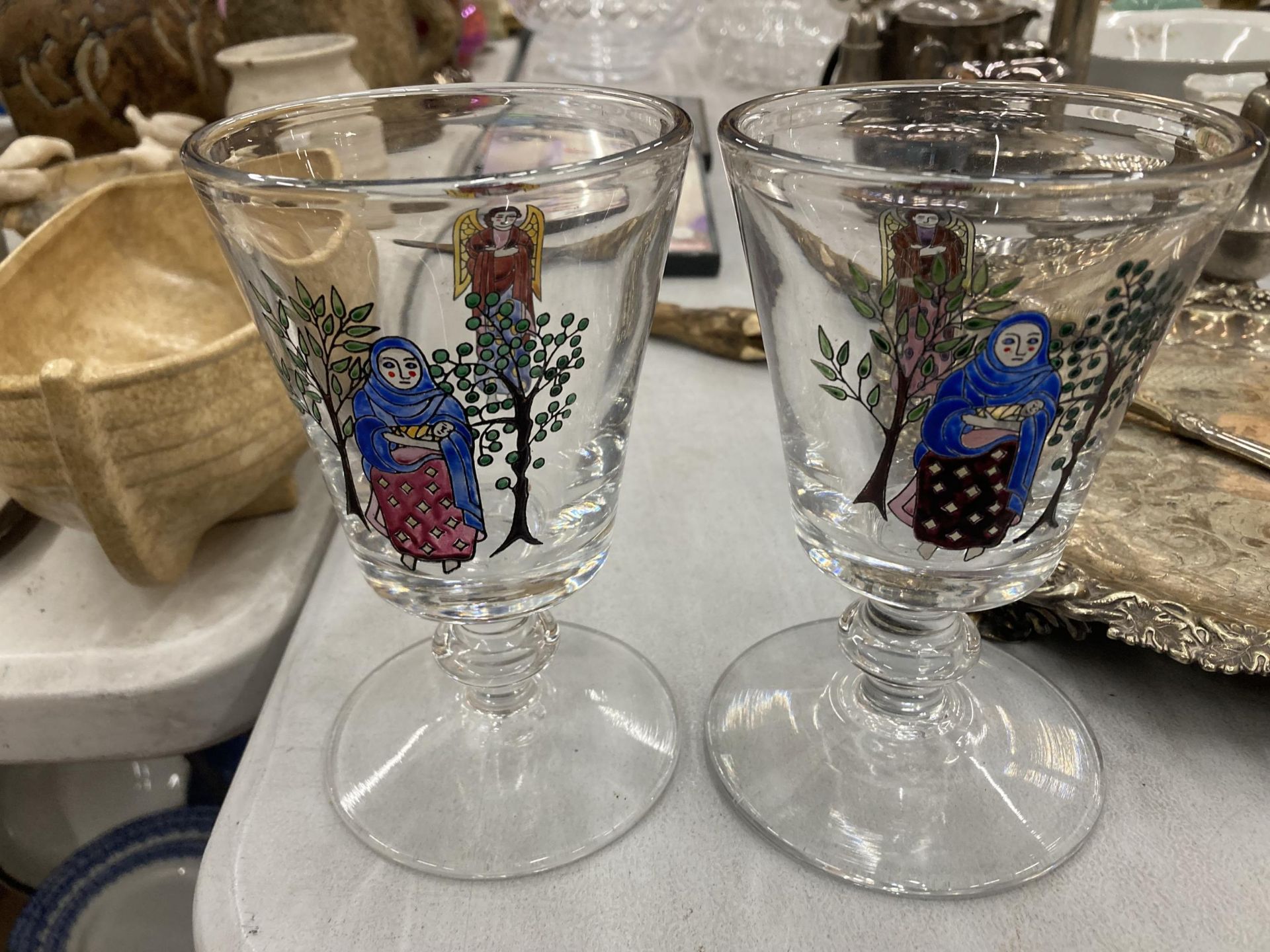 TWO LARGE HEAVY VINTAGE HAND BLOWN GLASSES WITH ANGEL AND MOTHER AND CHILD HAND PAINTED DESIGN