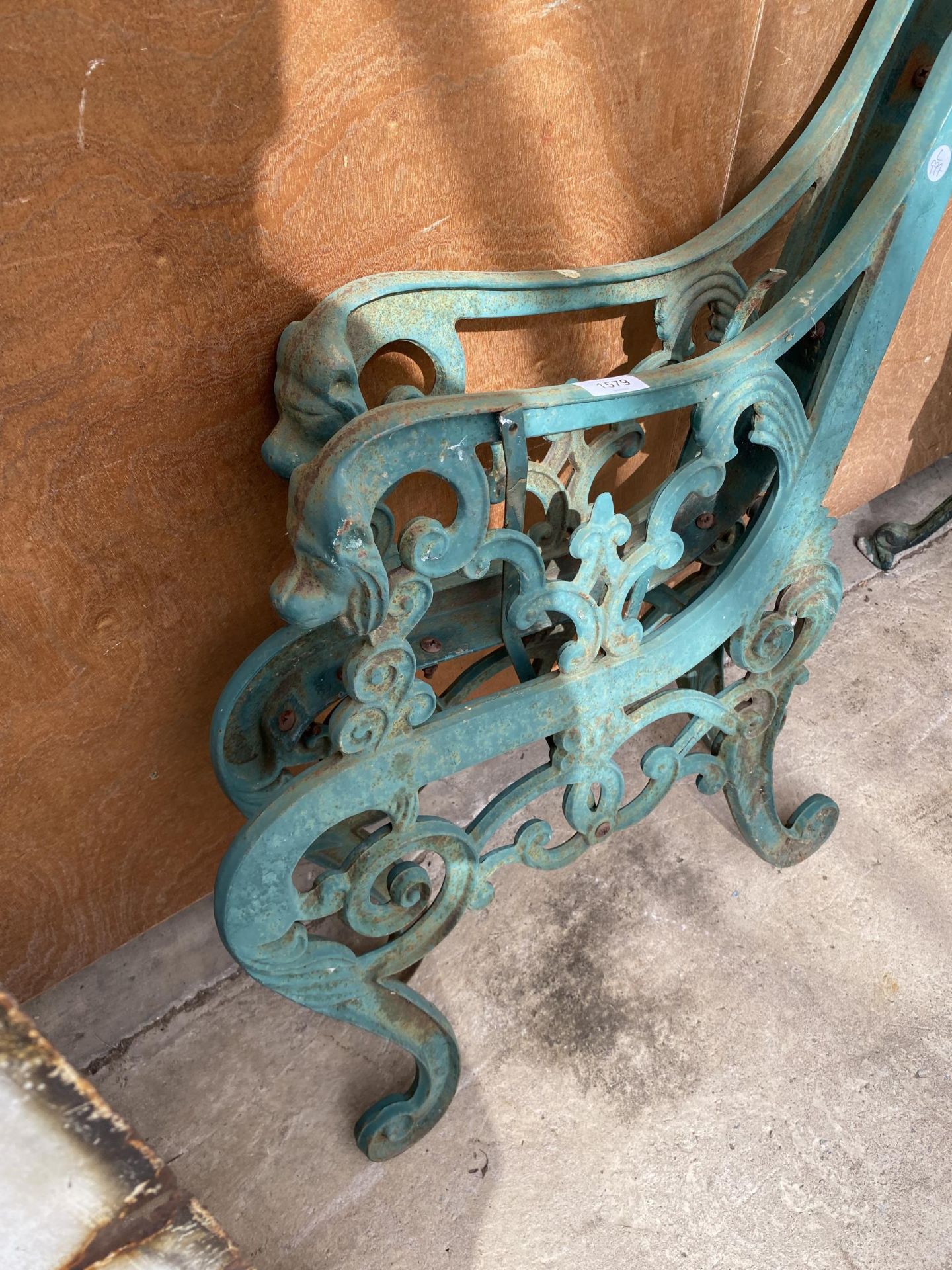 A PAIR OF DECORATIVE CAST IRON BENCH ENDS WITH LION HEAD ENDS - Image 2 of 3