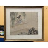 A GILT FRAMED ORIENTAL SIGNED WATERCOLOUR