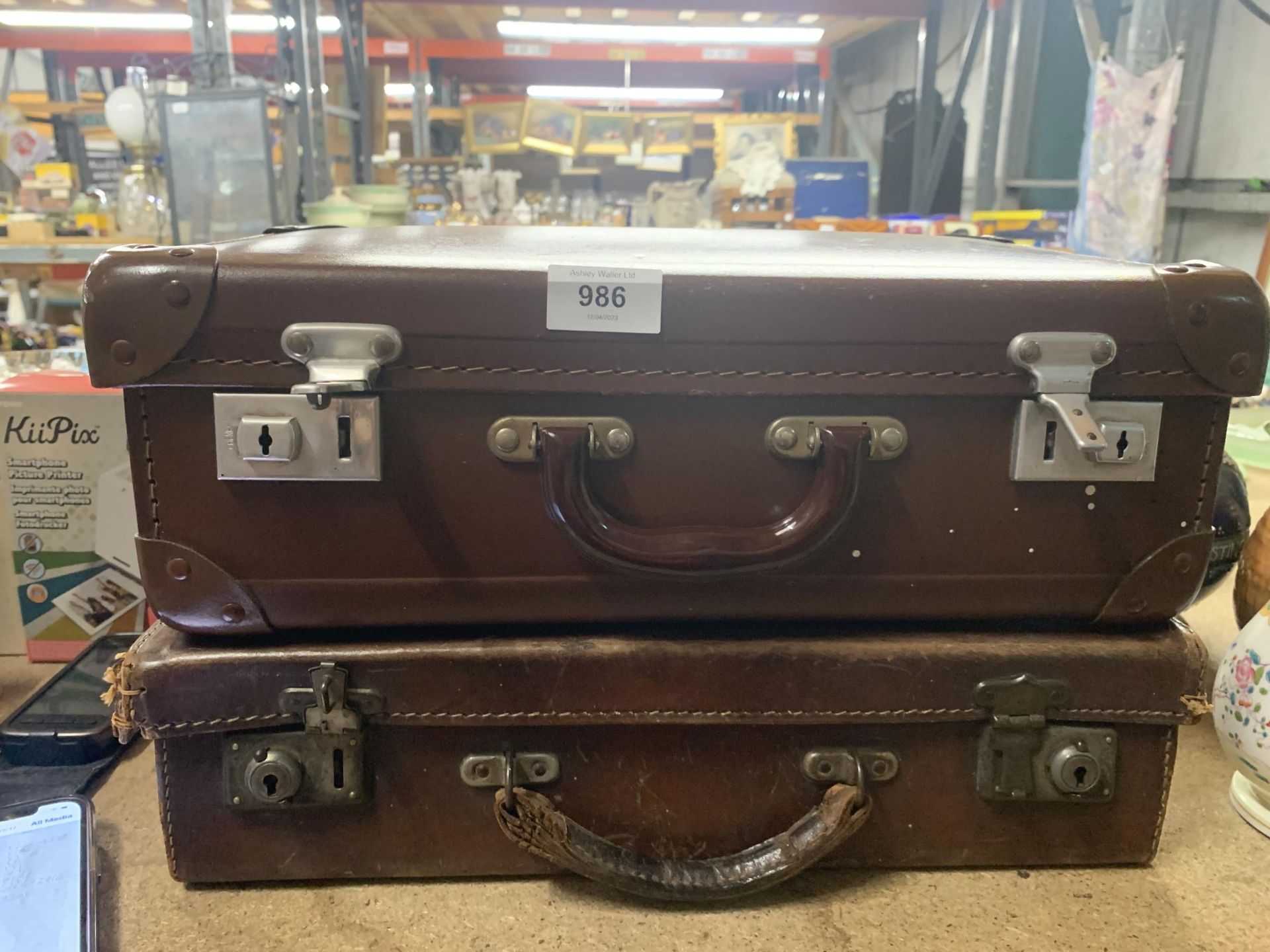 TWO SMALL VINTAGE LEATHER SUITCASES